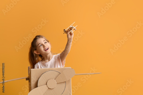Little girl playing with to...