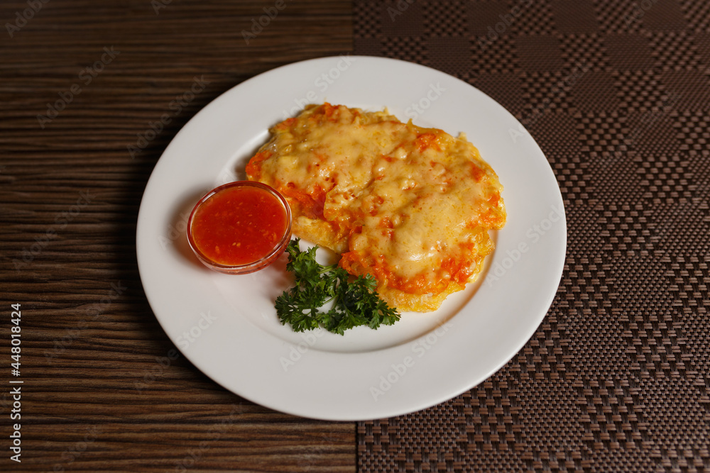 chicken chop with cheese and sauce chicken chop with cheese and sauce
