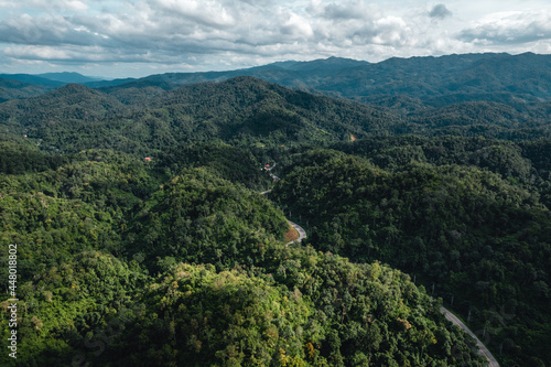 green mountains and bright sky