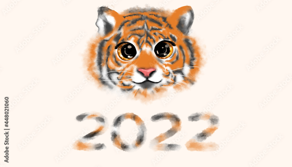 the muzzle of a cute little fluffy tiger cub. The symbol of the year 2022 according to the horoscope