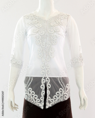 Brocade decorations on transparent kebaya clothes for women look elegant and beautiful.