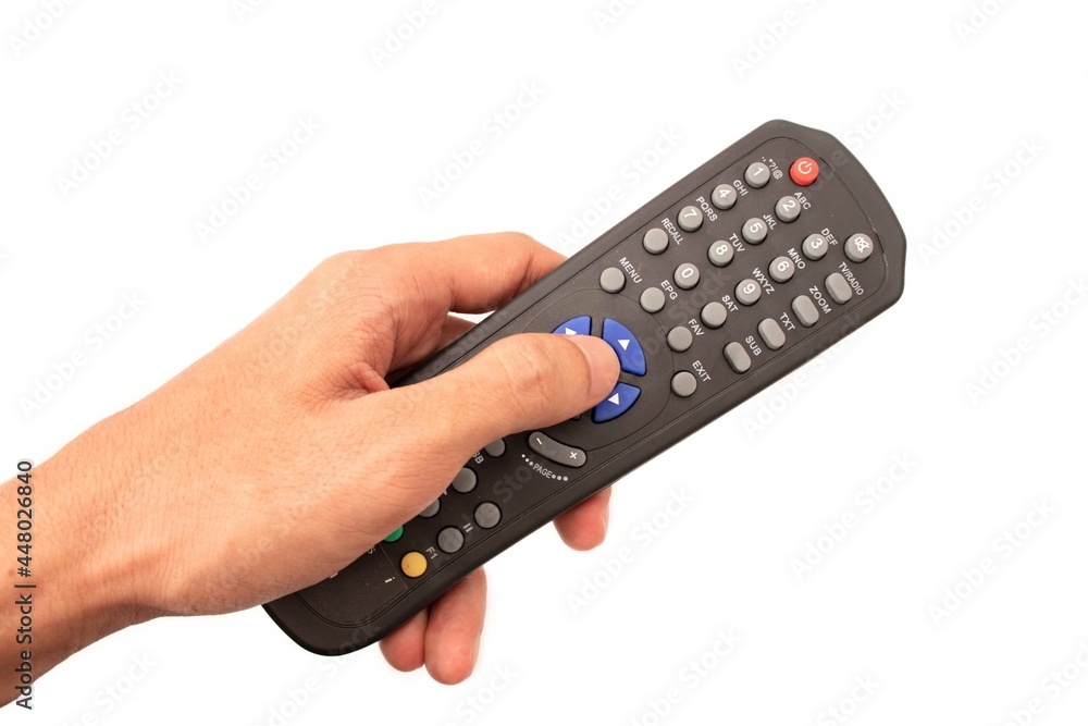 holding tv remote isolated on white background holding tv remote isolated on white background