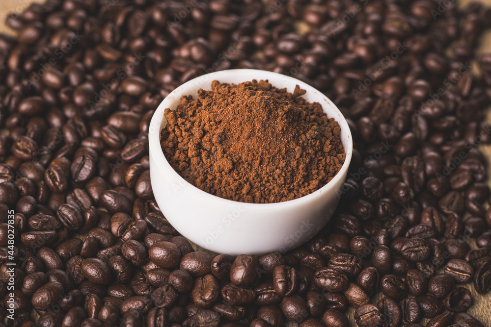 Coffee beans and powder with textured background stock image. Coffee beans and powder with textured background stock image.