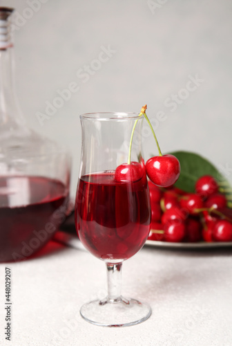 Fresh cherry liqueur in ele...