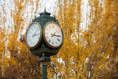 Autumn afternoon view of a historic clock in downtown Bakersfield, California, USA.