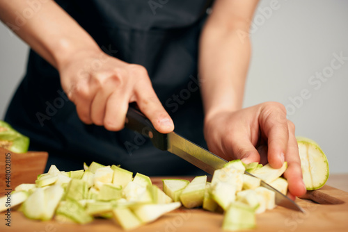 housewife cutting vegetables healthy eating vitamins in the kitchen