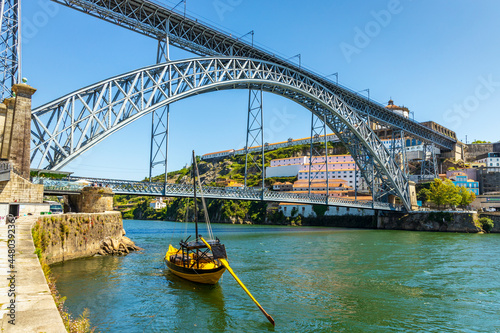 Beautiful Dom Luis I bridge over Douro river in Porto, Portugal © eunikas
