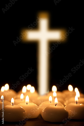 christening cross with candle