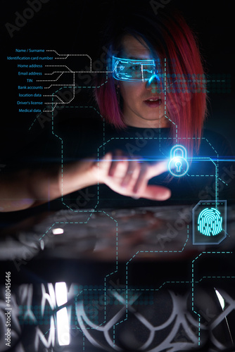 Beautiful woman in cyber futuristic style using a new technology to access the network.