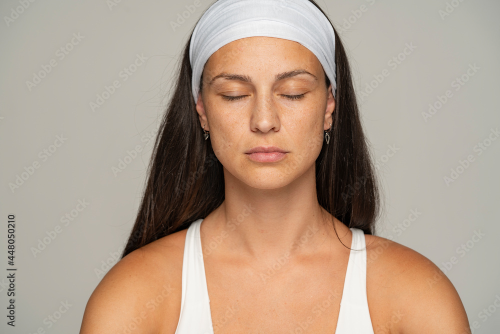 Portrait of a young woman without makeup and closed eyes Portrait of a young woman without makeup and closed eyes