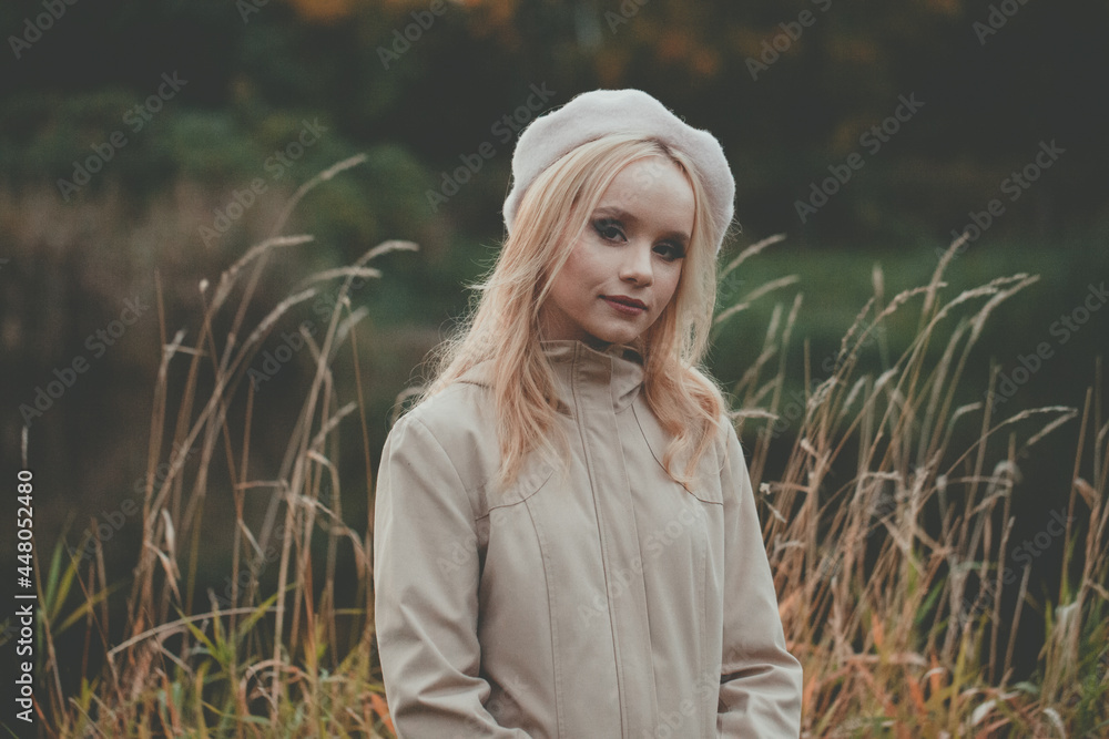 Beautiful autumn woman with autumn leaves on fall nature background Beautiful autumn woman with autumn leaves on fall nature background