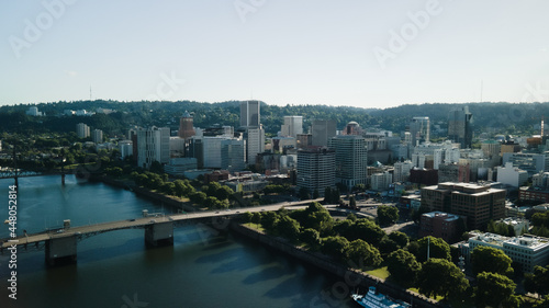 A bird's-eye view of a large city on the river bank. High quality photo © KropStock