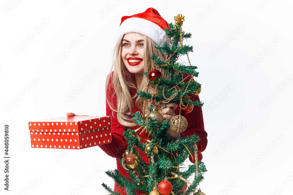 woman wearing santa hat gift holiday lifestyle tradition christmas