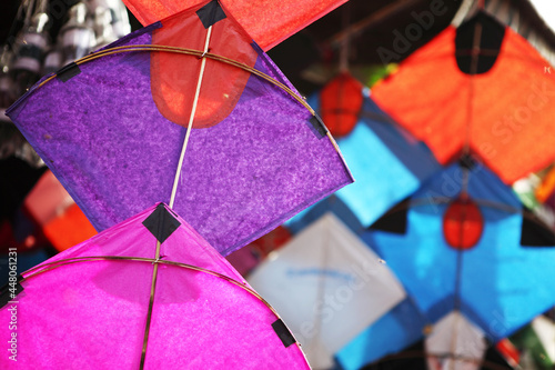 Colorful Paper Kites at Shop in Asian Market photo