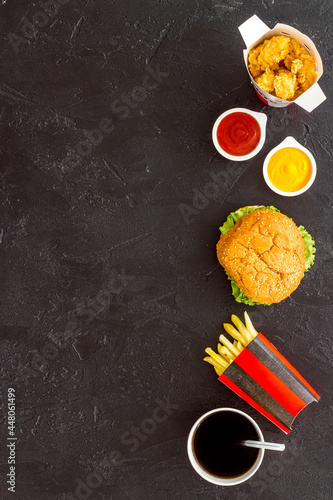 Set of fast food with hamburger and french fries. Top view