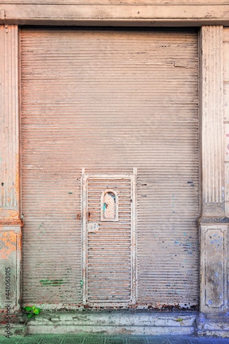 Old metallic business doors, Holguin, Cuba photo