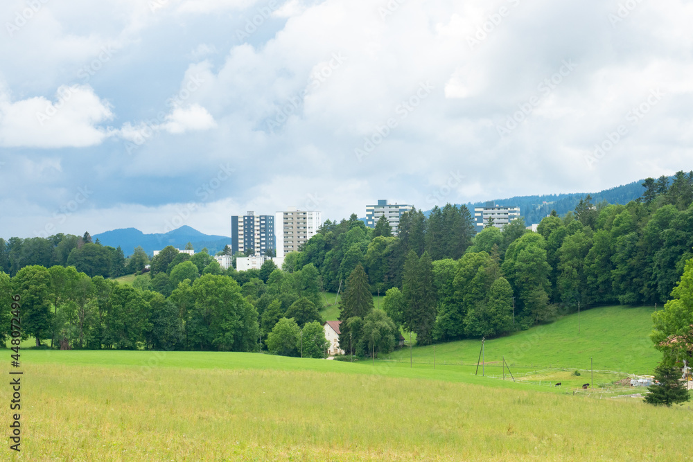 Skyscrapers of La-Chaux-de-Fonds, Switzerland, in the midst of the nature Skyscrapers of La-Chaux-de-Fonds, Switzerland, in the midst of the nature