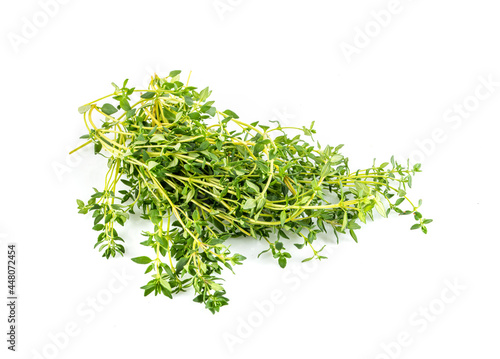 Fresh thyme in heap on white background.