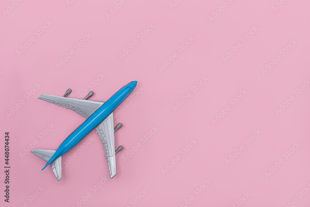 airplane on a pink background