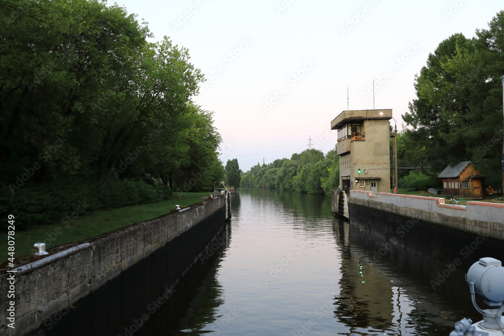 View of lock on Oka river at sunset
