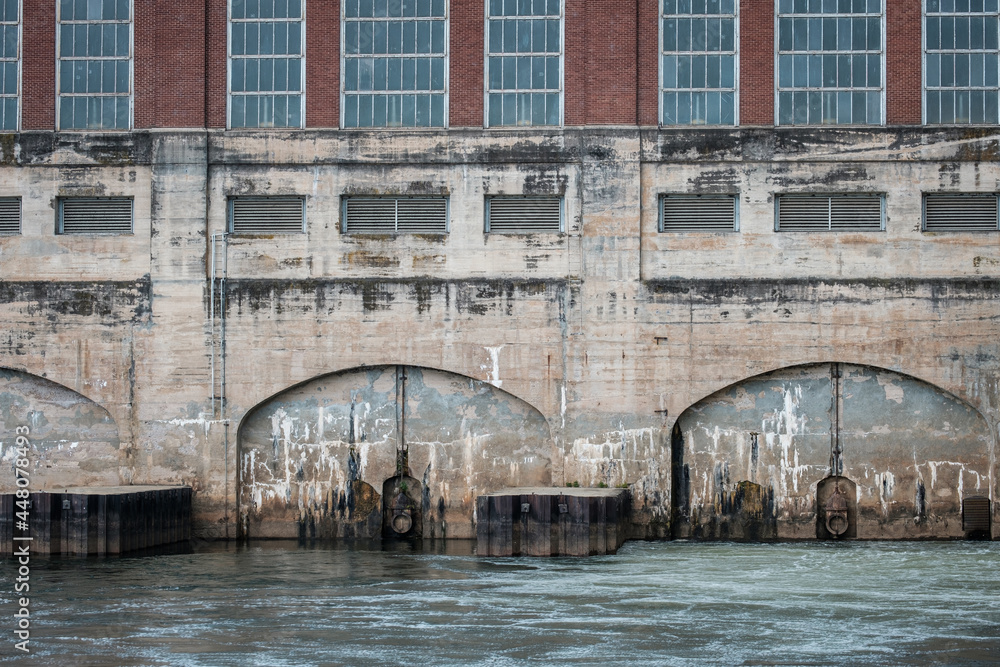 Windows, brick and concrete facade of dam on Catawba River in Fort Mill, South Carolina, USA
