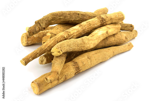 Ashwagandha Dry Root Medicinal Herb, also known as Withania Somnifera, Ashwagandha, Indian Ginseng, Poison Gooseberry, or Winter Cherry. Isolated on White Background.