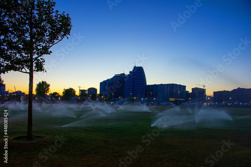 The evening boulevard is being watered. Baku city