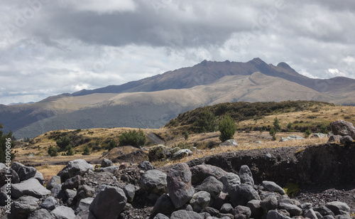 Pasochoa is an extinct volcano located in the Ecuadorian Andes. In the foreground are volcanic rocks from the last eruption which was 100,000 years ago.
