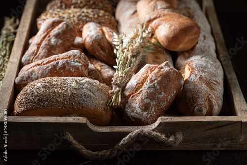 Rustic baguettes and buns for healthy breakfast. Made of wheat. © shaiith