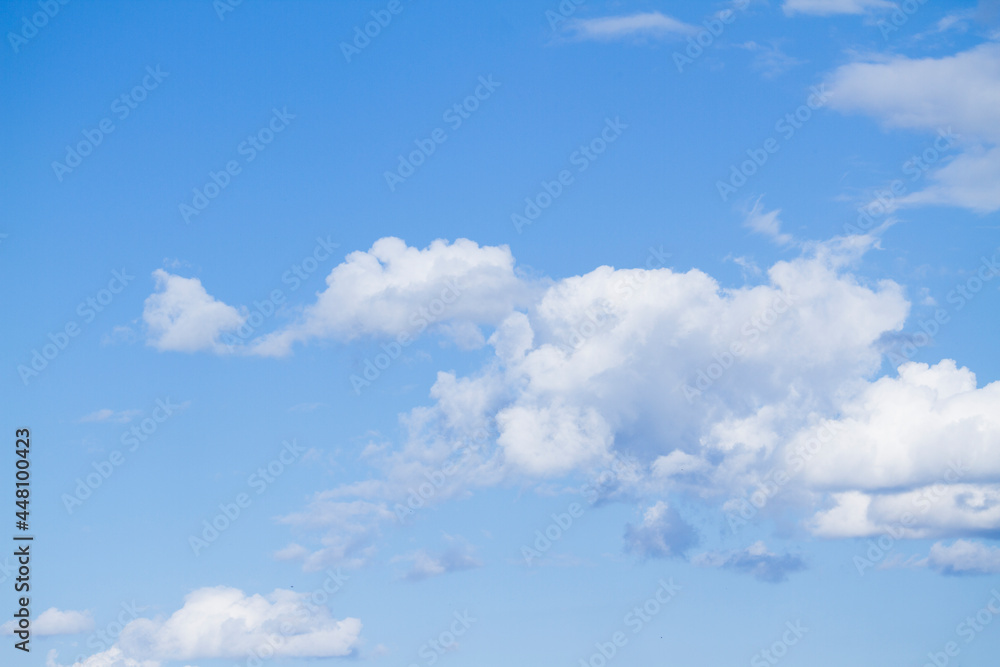 White clouds in blue sky on sunny summer day at countryside White clouds in blue sky on sunny summer day at countryside