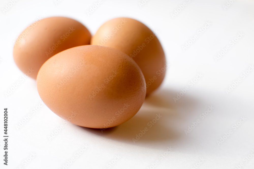A beautiful brown egg placed on the table A beautiful brown egg placed on the table