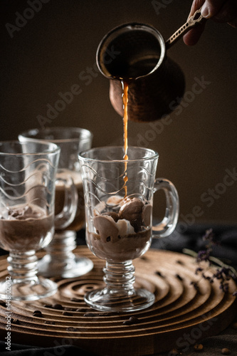 coffee latte in a glass on a dark background. High quality photo