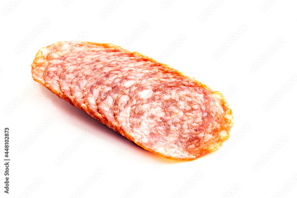 Sliced sausage isolated on a white background.food concept Sliced sausage isolated on a white background.food concept