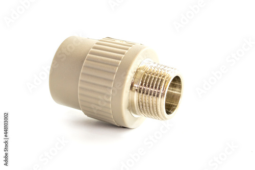 Combined couplings for connecting metal and polypropylene water pipes isolated on white background.