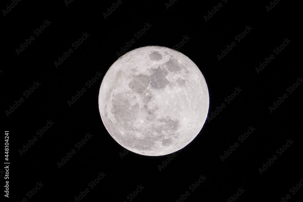 Fullmoon phase on July 25, 2021. Closeup of the super fullmoon in the summer Full moon Total Lunar in night dark shining bright texture isolated on black back Fullmoon phase on July 25, 2021. Closeup of the super fullmoon in the summer Full moon Total Lunar in night dark shining bright texture isolated on black back