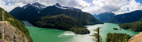 Diablo Lake reservoir and cliff at North Cascades National Park Summer in Washington State during summer. Panorama landscape.