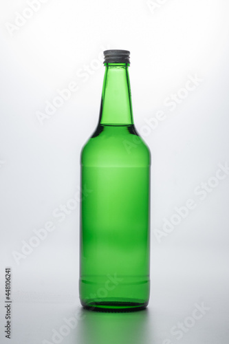 green bottle isolated on white