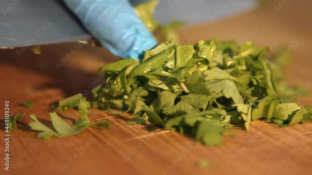 chef cuts parsley for salad chef cuts parsley for salad