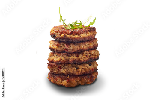 Stacked lentil's vegan  homemade patties, isolated on a white.