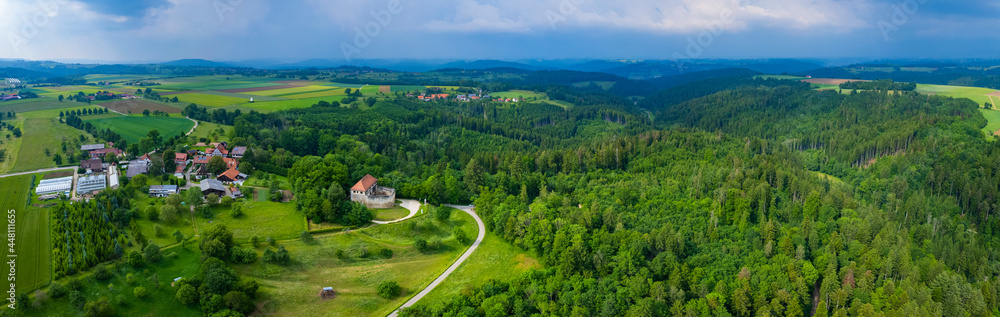 Aerial view around the city Wäschenbeuren in Germany, on a cloudy day in Spring