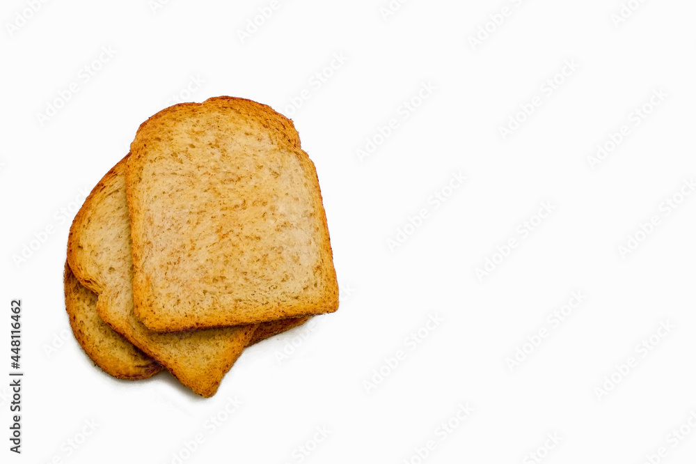  3 pieces of whole wheat toast on white background with copy space .slices of bread