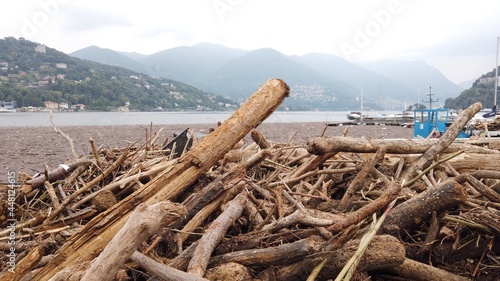 Europe, Italy, Como, July 2021  extensive damage after the flood in Como - Lake Como is full of woods and trees undermined by the force of the storm due to rain and overflowing rivers © andrea