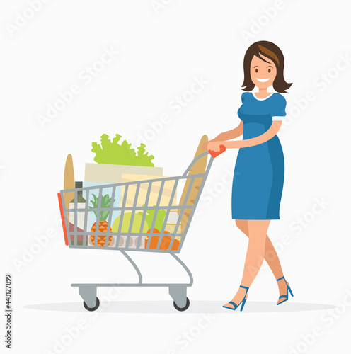 Woman is carrying a grocery cart full of groceries in the supermarket. Vector illustration.