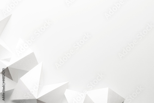 White triangular shapes made paper, abstract background