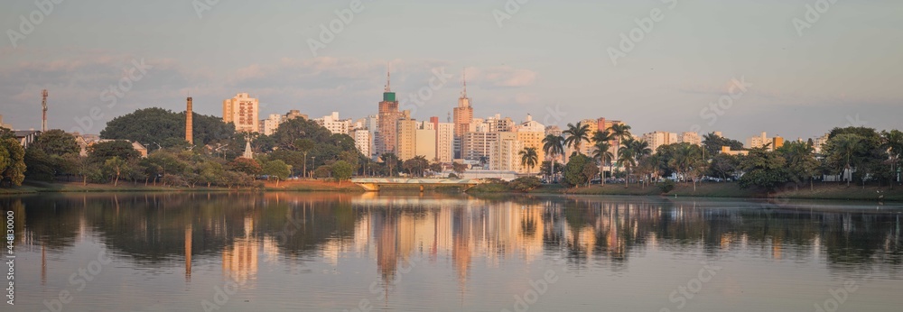 Buildings reflected in the dam at dawn - Panoramic photography - Sao Jose do Rio Preto - Brazil