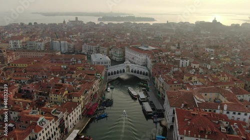 Aerial view of Rialto Bridge: the oldest bridge on Grand Canal in Venice, Italy photo