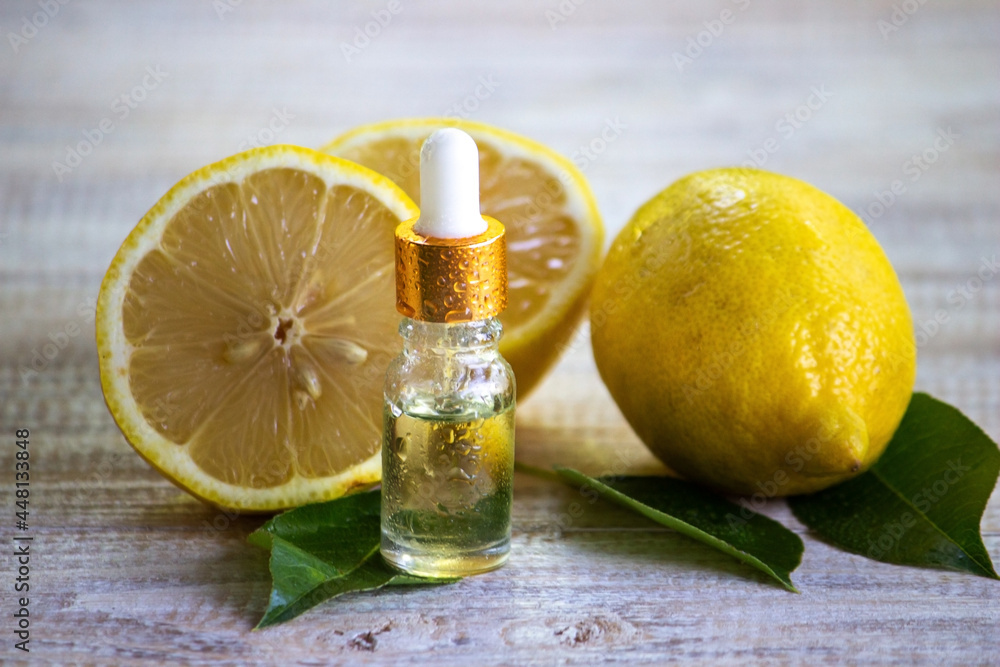 A bottle of lemon essential oil is an alternative medicine. A bottle of lemon essential oil is an alternative medicine.