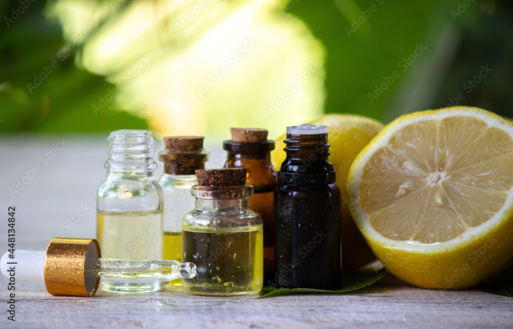 A bottle of lemon essential oil is an alternative medicine. A bottle of lemon essential oil is an alternative medicine.