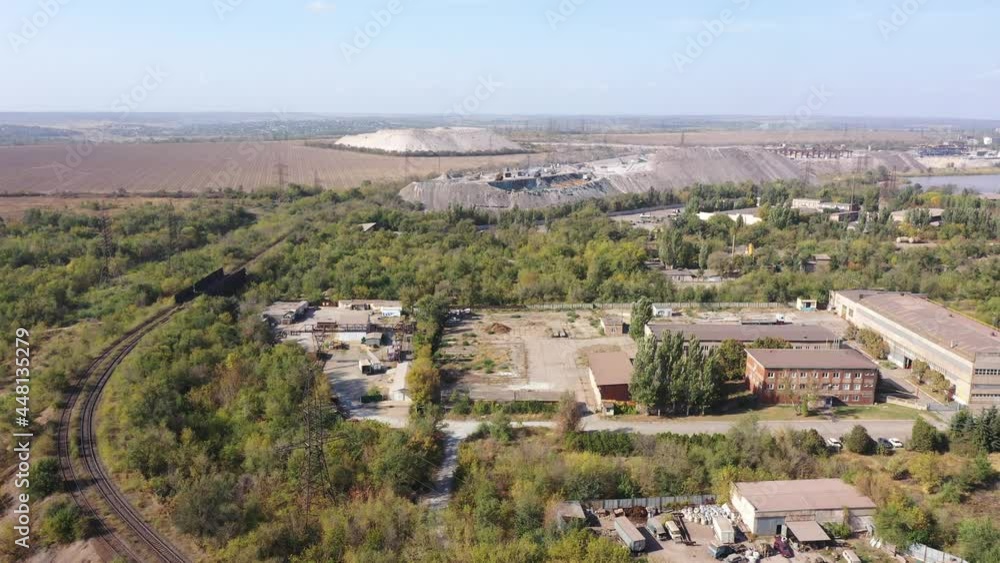 Top view of slag mountains. Slag is the by-product left over after a desired metal has been separated from its raw ore. Metallurgical industry Top view of slag mountains. Slag is the by-product left over after a desired metal has been separated from its raw ore. Metallurgical industry