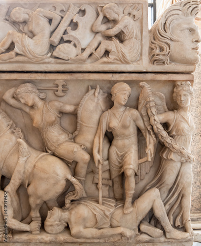 Ancient roman battle scene carved on a marble monument © Giorgio G